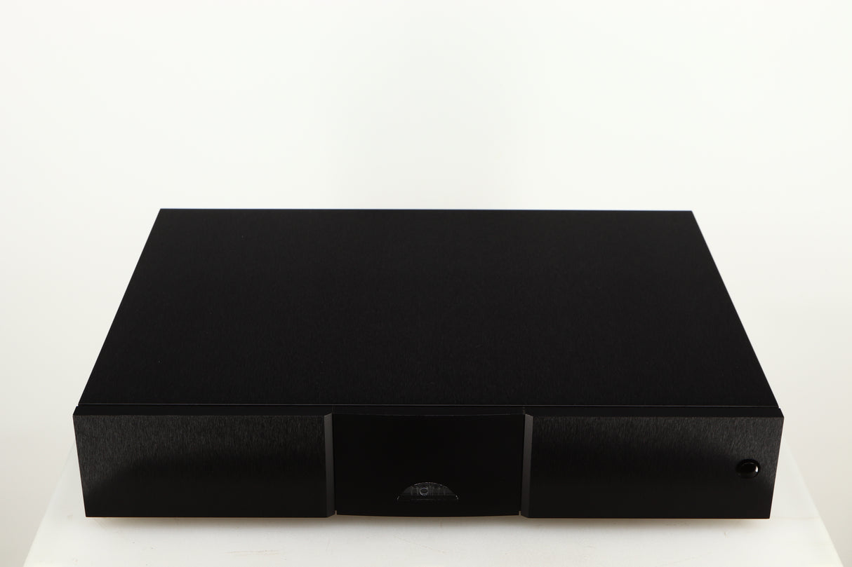 Top of a used Naim CD555PS DR Power Supply in a black finish