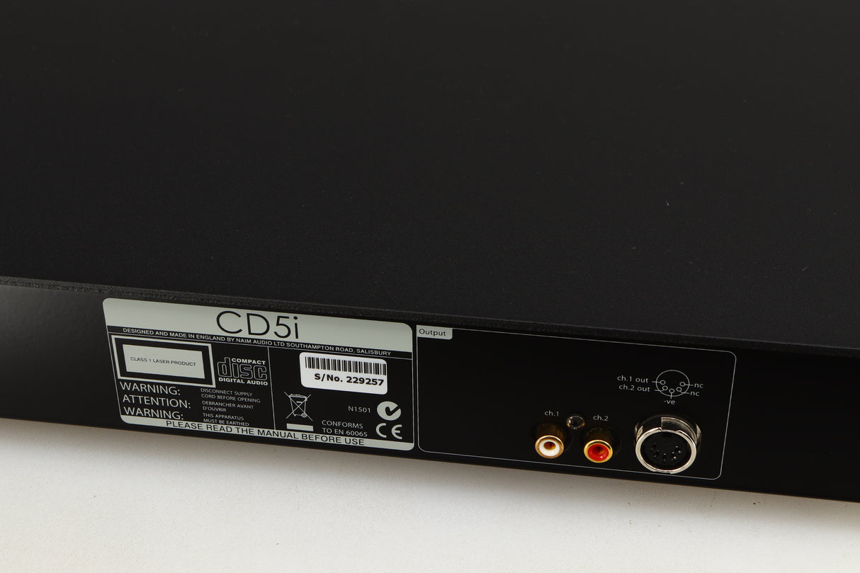Close up of a used Naim CD5i CD Player in a black finish showing scratches on top near rear