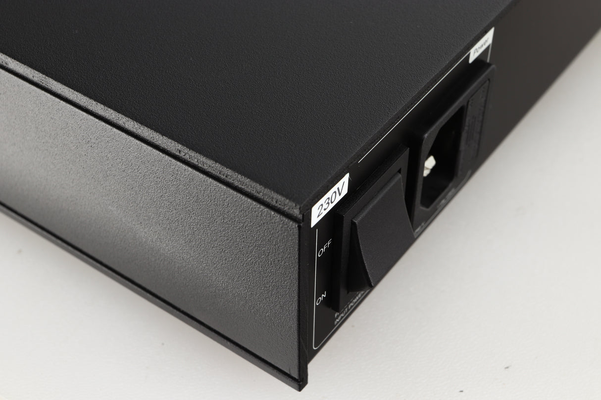 Close up of a used Naim Flatcap 2X Power Supply in a black finish showing some scratching on right side