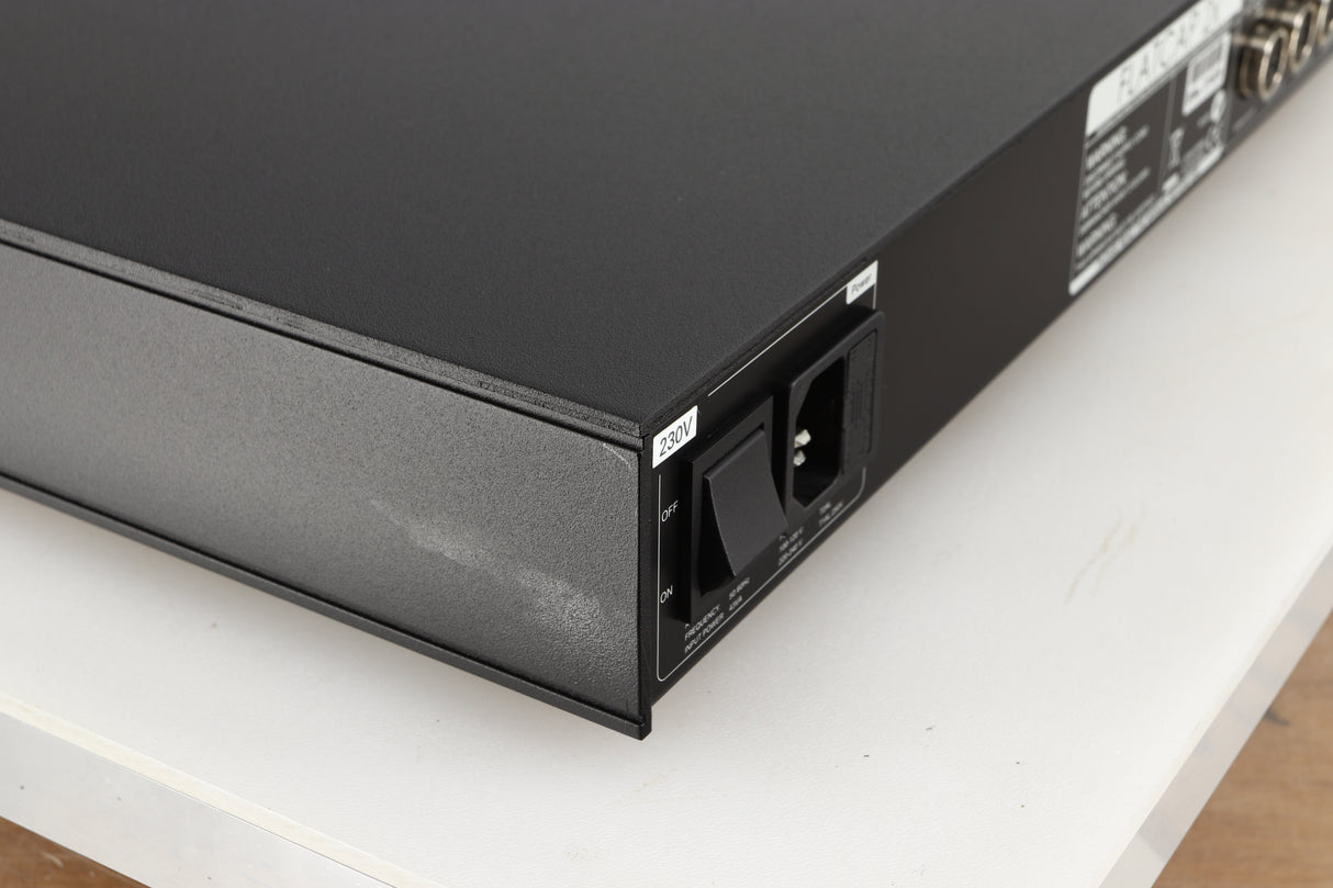 Rear right corner of a used Naim Flatcap 2X Power Supply in a black finish