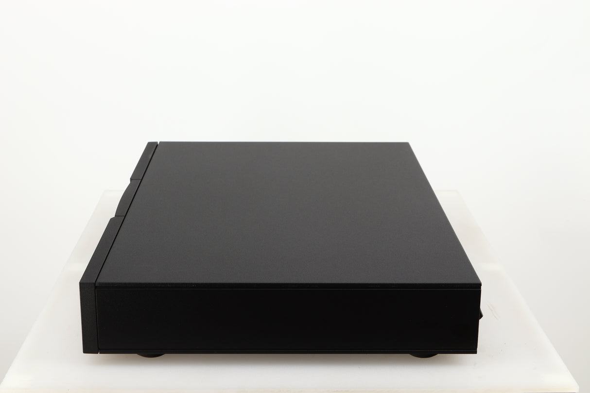 Right side view of a used Naim Flatcap 2X Power Supply in a black finish