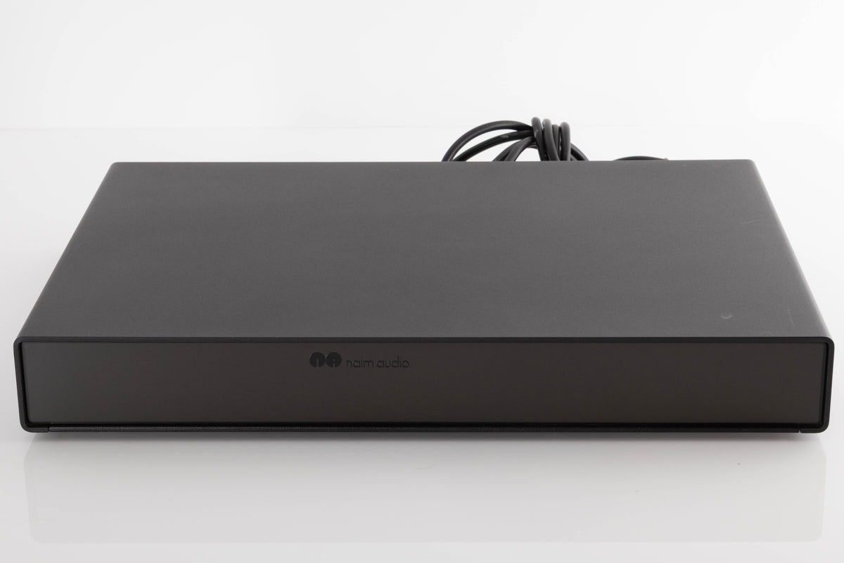 Front view of a used Naim Flatcap Power Supply in a Black finish