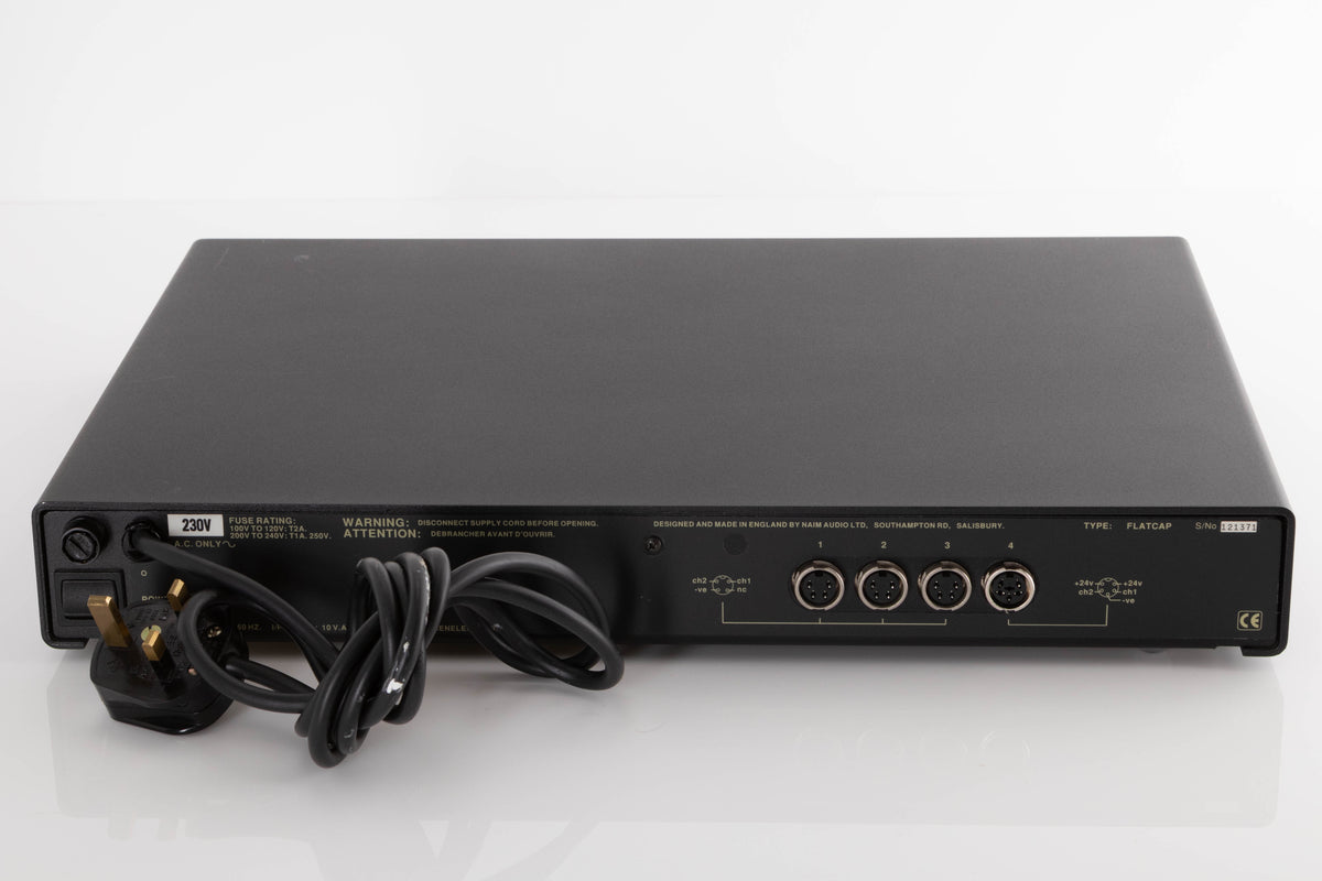 Rear view of a used Naim Flatcap Power Supply in a Black finish showing DIN Inputs