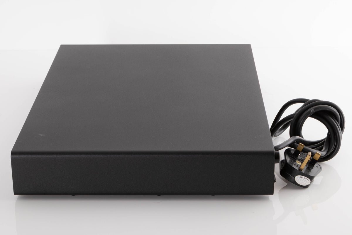 Right side view of a used Naim Flatcap Power Supply in a Black finish