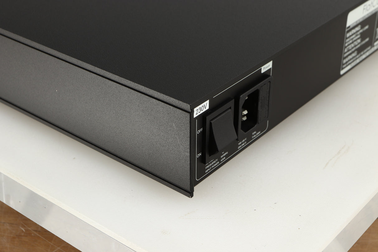 Rear right corner of a used Naim Flatcap XS Power Supply in a black finish