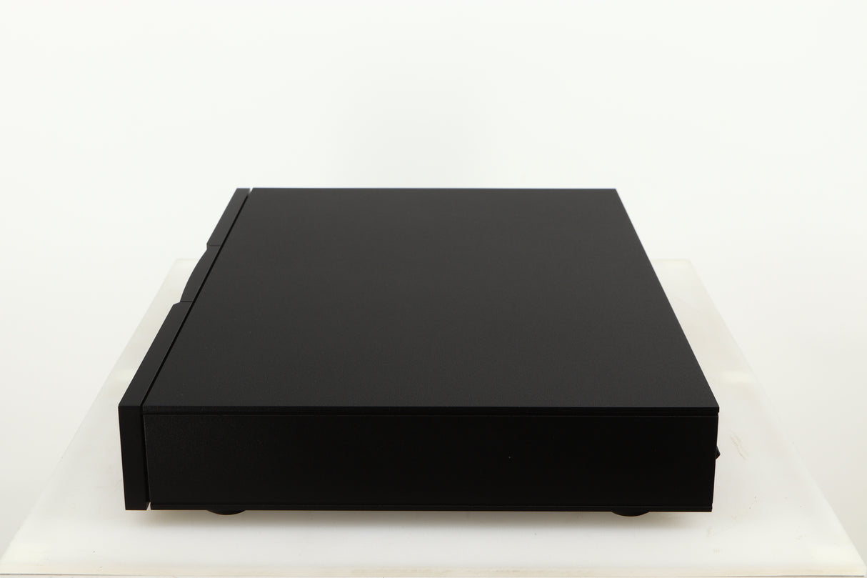Right side view of a used Naim Flatcap XS Power Supply in a black finish