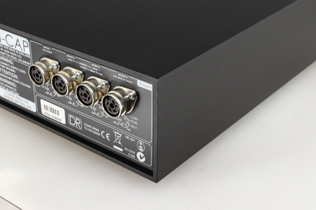 Rear left corner of a used Naim Hicap DR Power Supply in a black finish