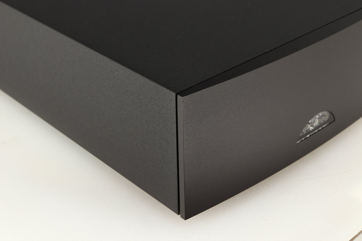 Front left corner of a used Naim Hicap DR Power Supply in a black finish