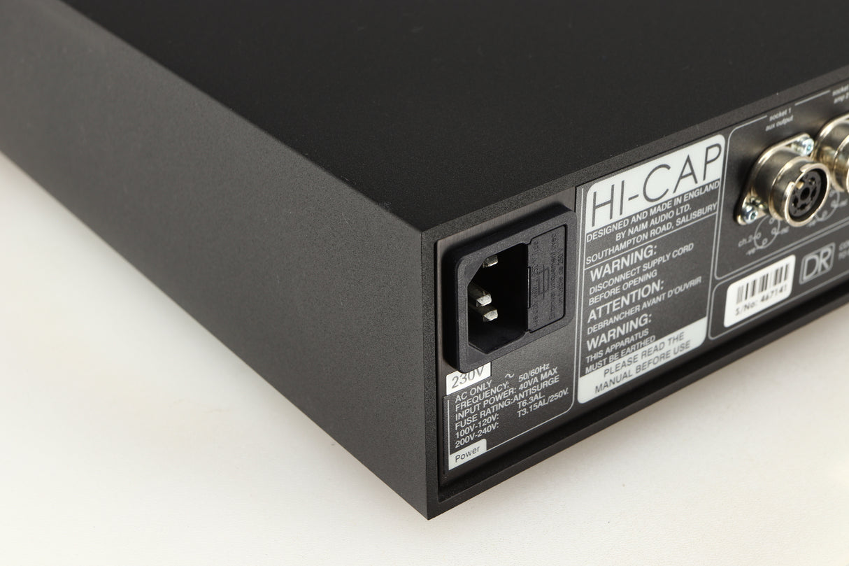 Rear right corner of a used Naim Hicap DR Power Supply in a black finish