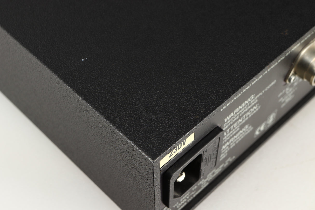 Close up of a used Naim Hicap Power Supply in a black finish showing mark on top