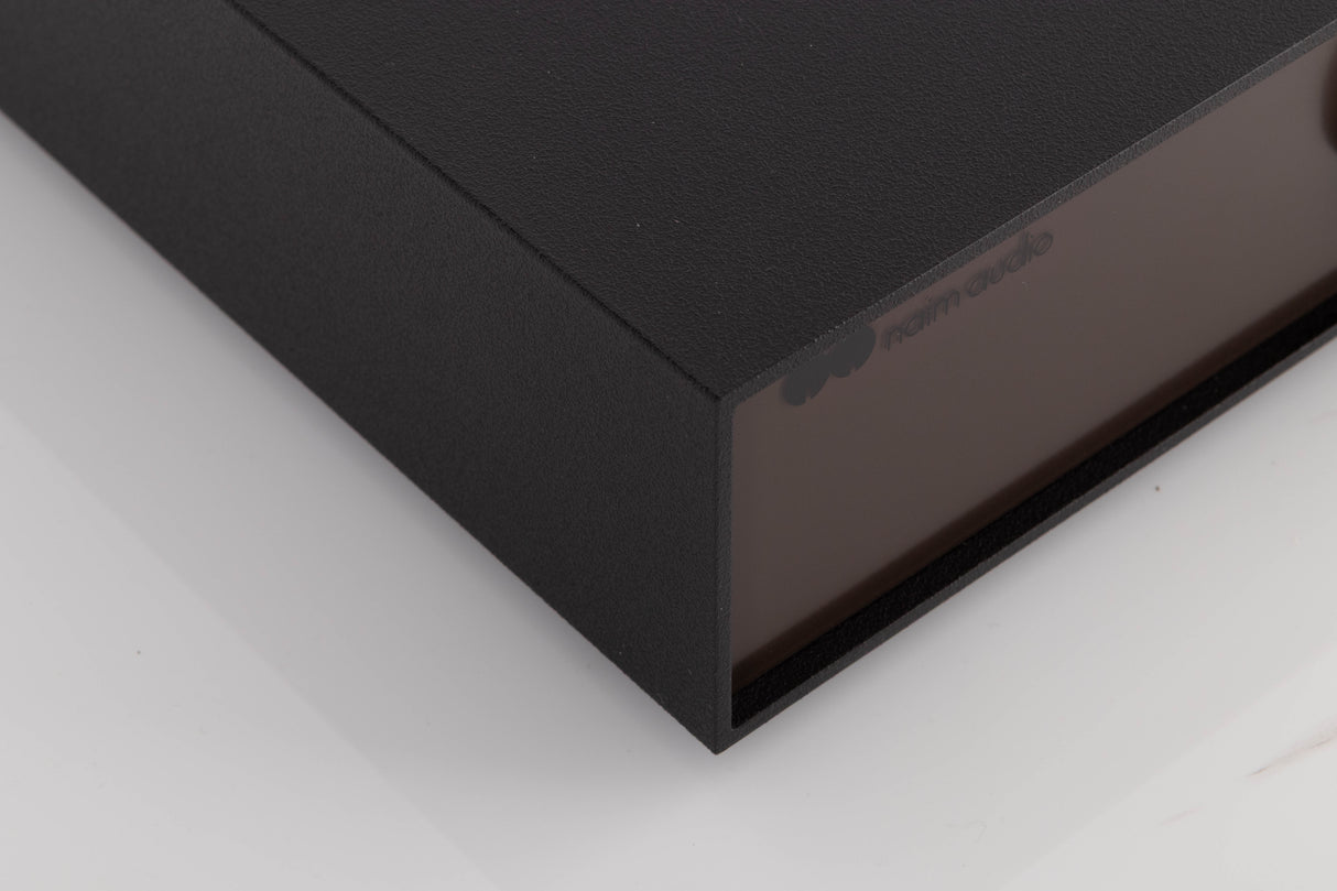 Front left corner of a used Naim Hicap Power Supply in a Black finish