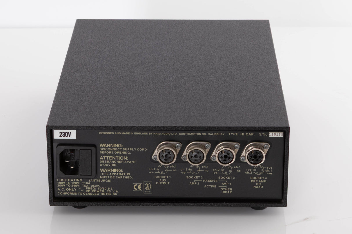 Rear view of a used Naim Hicap Power Supply in a Black finish showing Mains Input and AUX Output