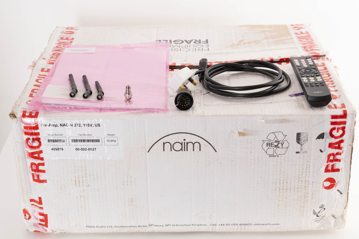 Box of a used Naim NAC N-272 Pre Amplifier with mains cable, manual, remote, BNC adaptor, burndy plug, and 3x antenna