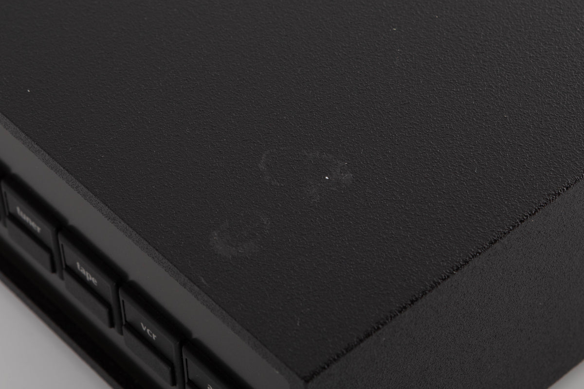 Close up of a used Naim NAC102 W/ NAPSC in a Black finish showing marks on top