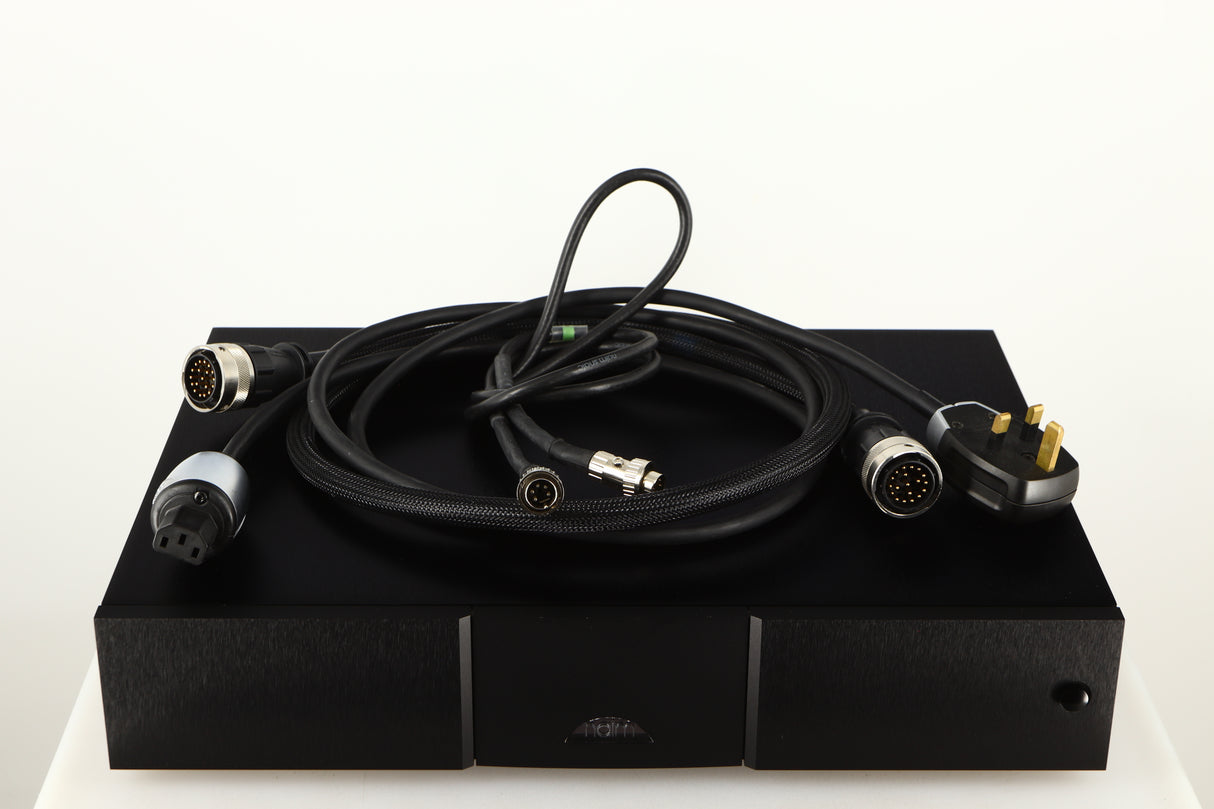 Top of a used Naim 552PS Power Supply in a black finish showing Burndy Cable, Mains Cable and SNAIC5