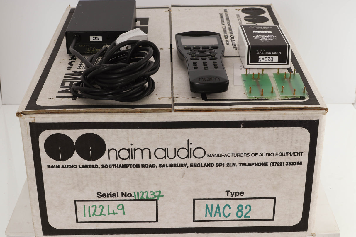 Box of a used Naim NAC82 Pre Amplifier with NAPSC Power Supply with remote, NA523/1 Phono Boards fitted, and POTS5