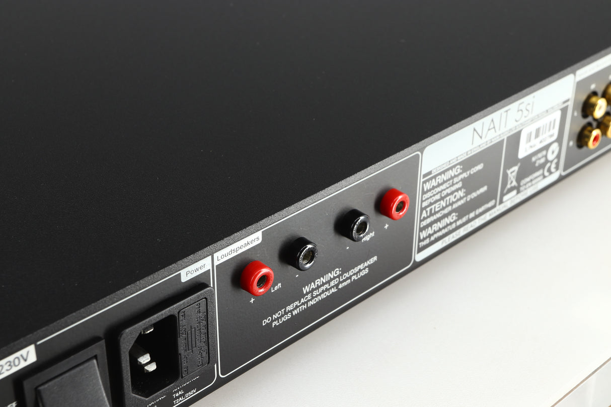 Close up of a used Naim NAIT 5si Integrated Amplifier in a black finish showing scratching on the rear