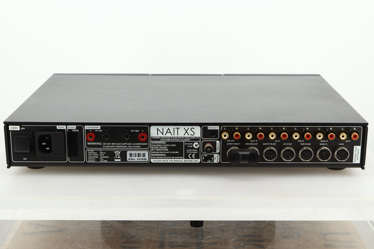 Rear view of a used Naim Nait XS-2 Integrated Amplifier showing mains input, speaker outputs, RCA, and SNAIC inputs