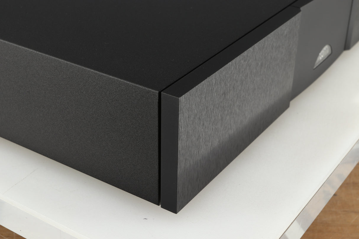 Front left corner of a used Naim NAP 250 Power Amplifier in a black finish