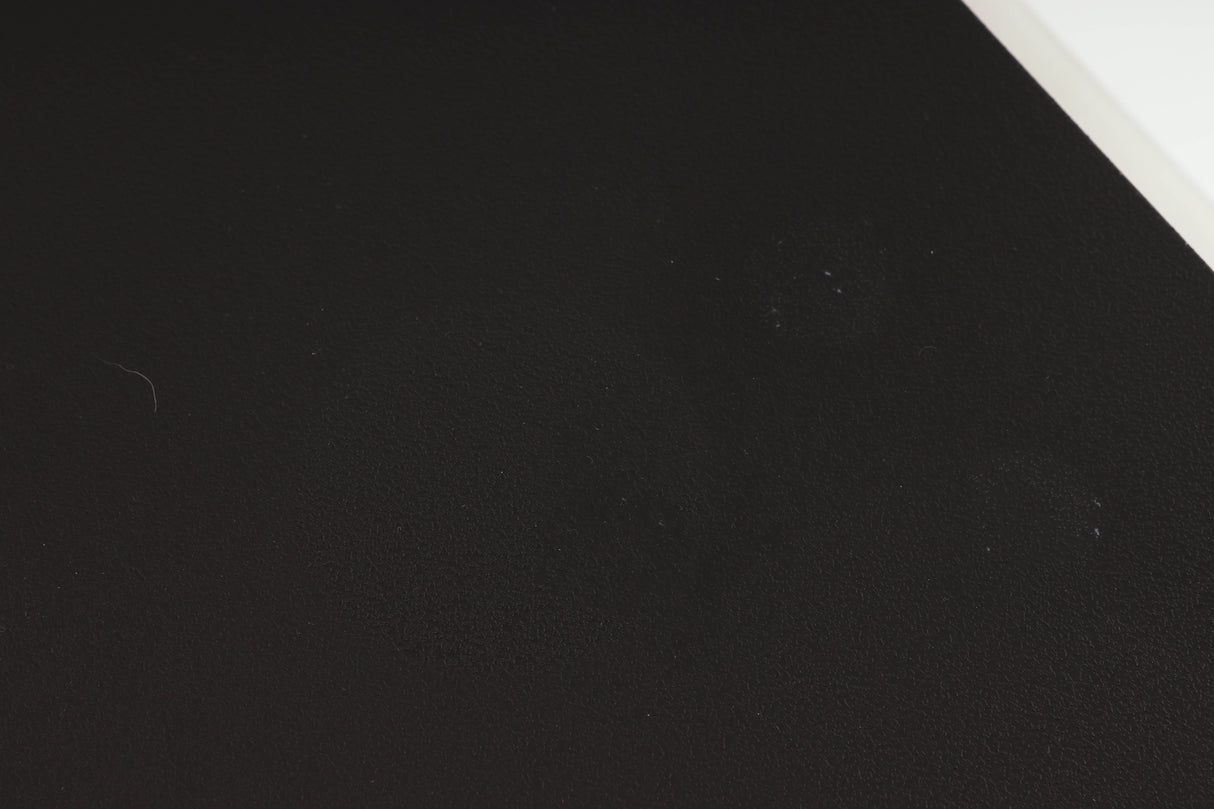 Close up of a used Naim NAP250 Power Amplifier in a black finish showing marks on top