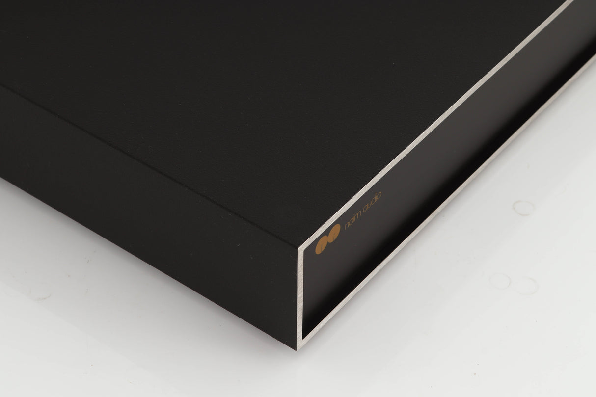 Front left corner of a used Naim NAP250 Power Amplifier in a black finish