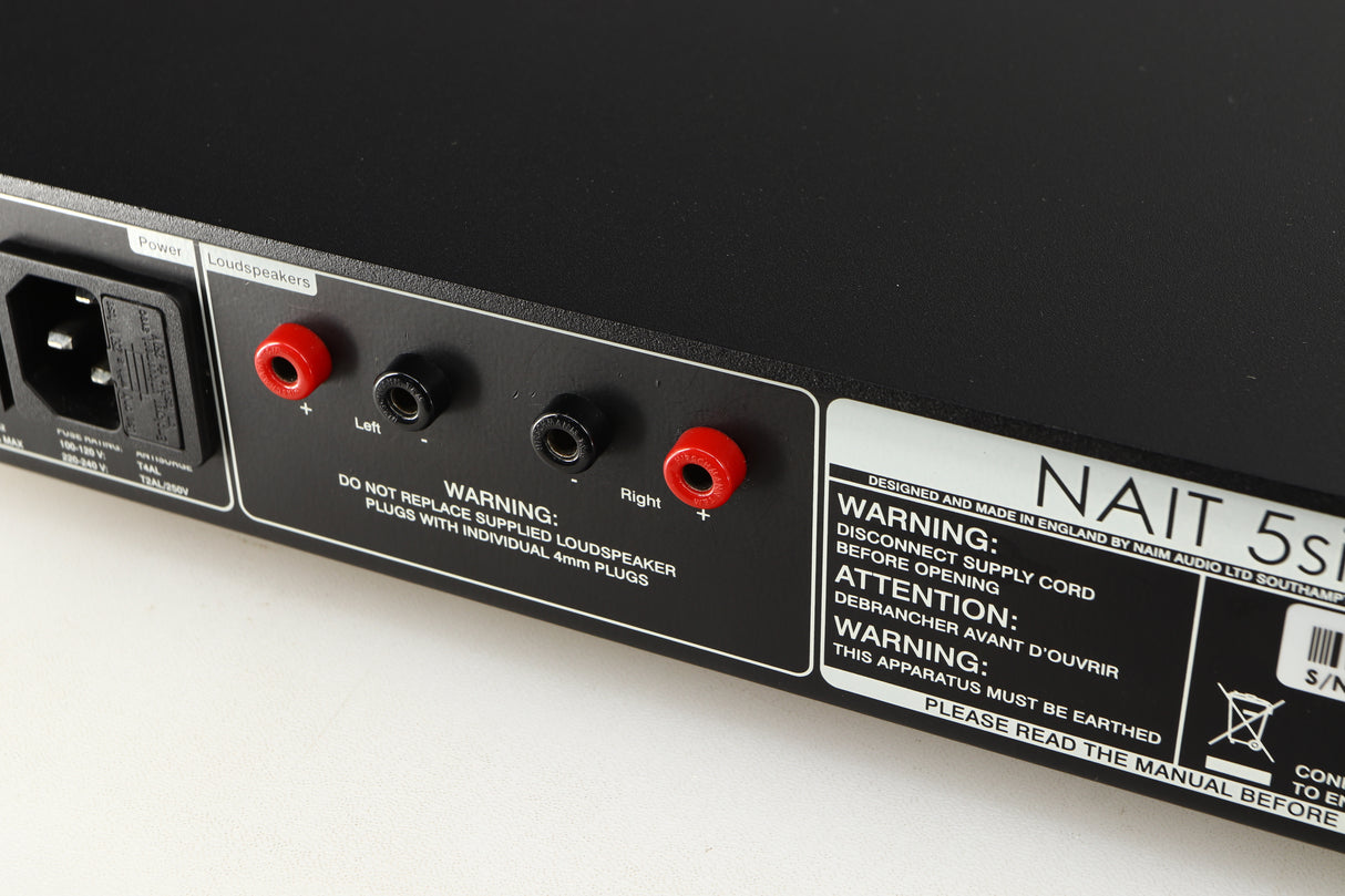 Close up of a used Naim Nait 5si Integrated Amplifier in a black finish showing some scratching on rear