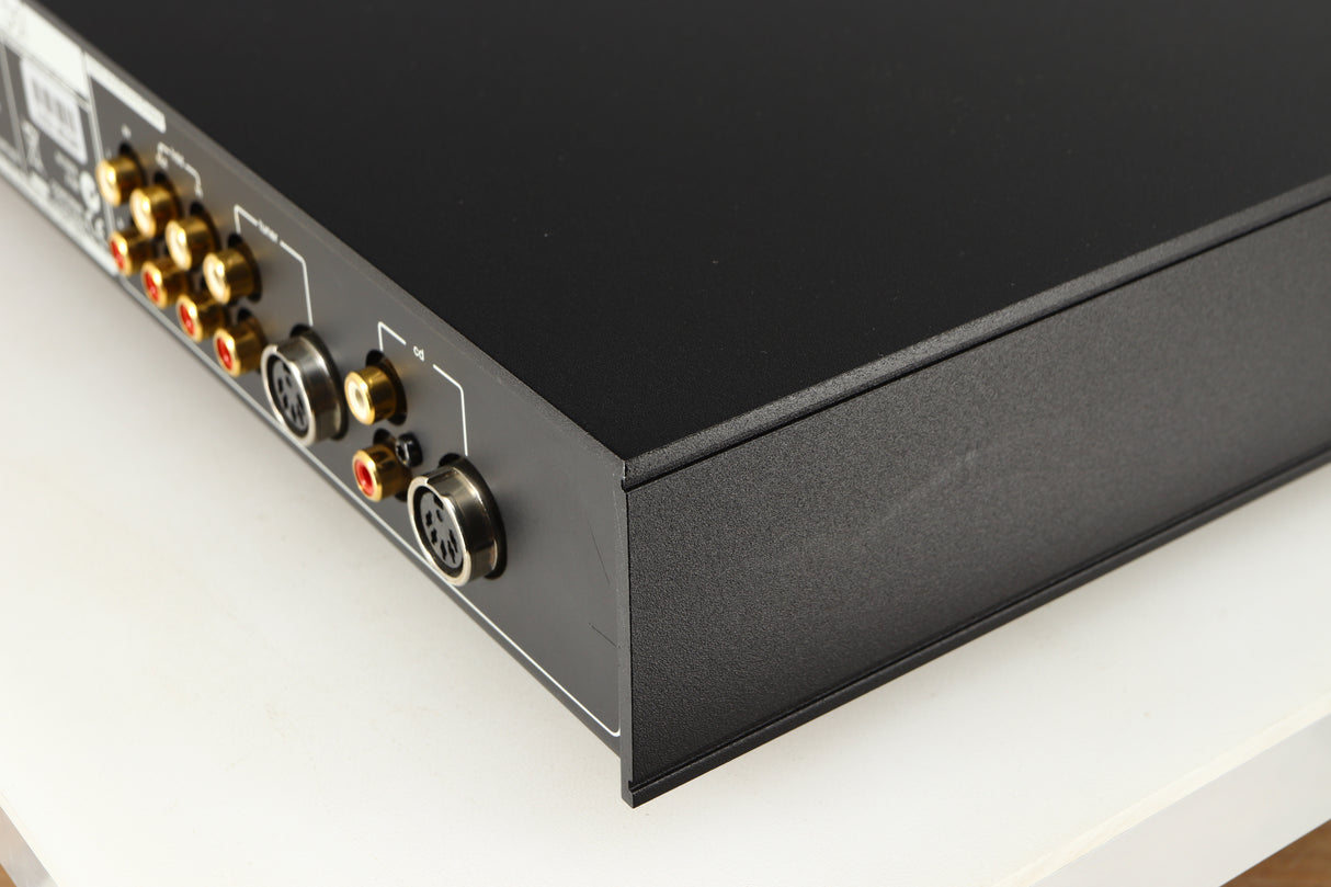 Rear left corner of a used Naim Nait 5si Integrated Amplifier in a black finish
