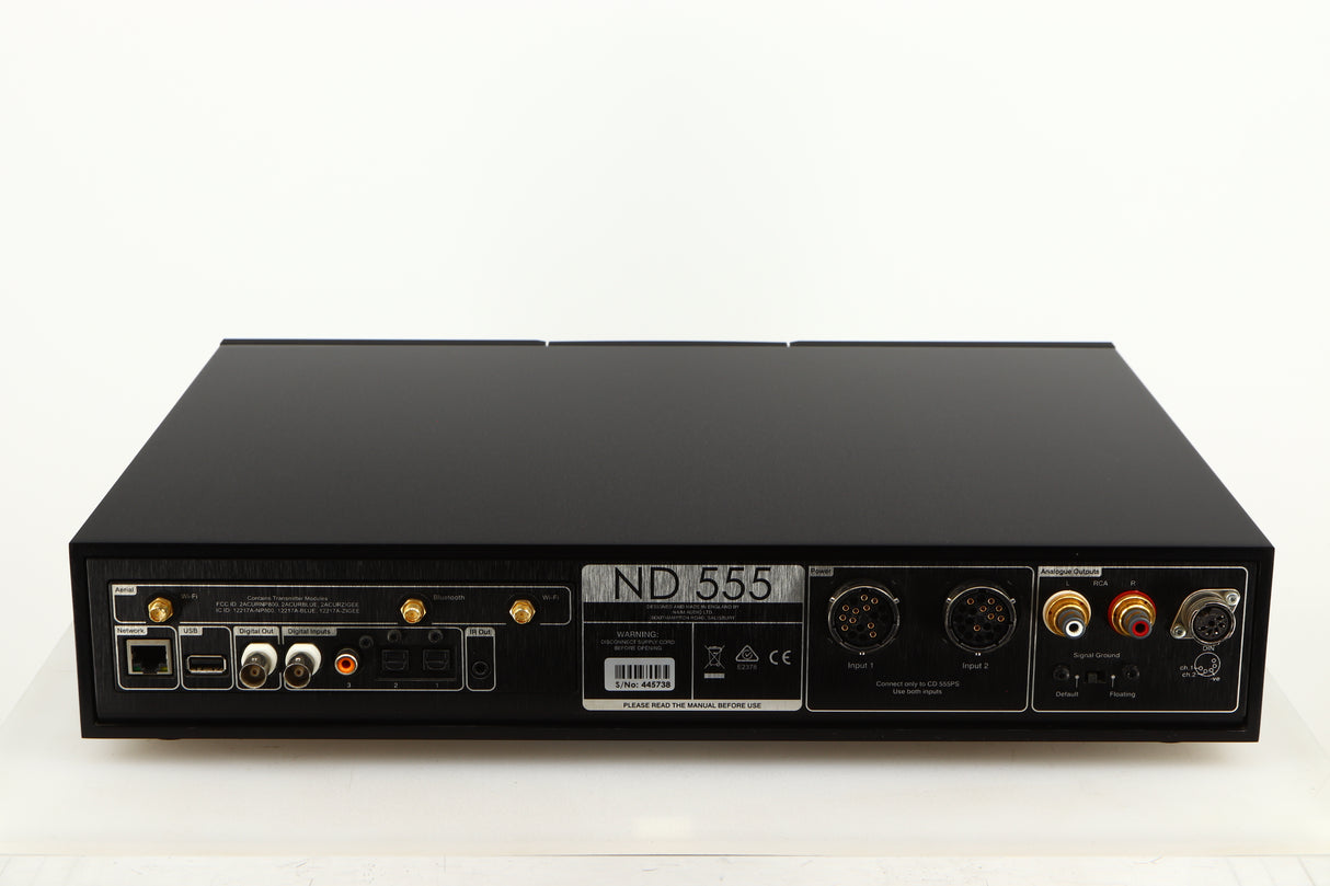 Rear view of a used Naim ND555 Media Player in a black finish showing Network Input, Optical Inputs, Power Inputs, USB Input and Analogue Outputs