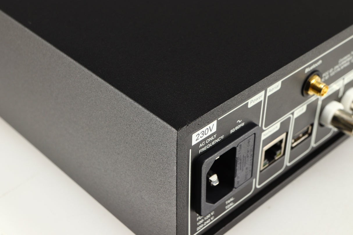 Close up of a used Naim NDX2 Network Streamer in a black finish showing nick on rear edge