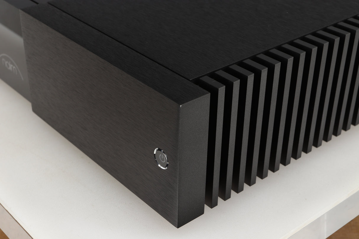 Front right corner of a used Naim New Classic NAP250 Power Amplifier in a black finish