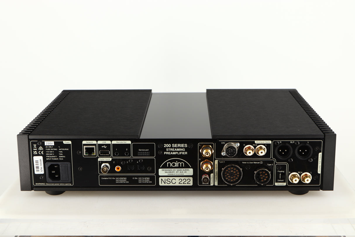 Rear view of a used Naim NSC 222 Streaming Pre Amplifier in a black finish showing Mains Input, USB Input, Network Input, Optical Inputs, Phono Inputs, Phono Outputs, DIN Input and XLR Outputs