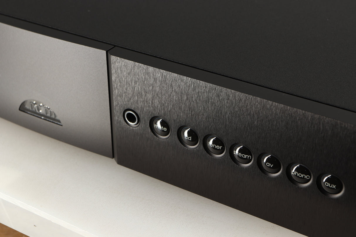 Close up of a used Naim Supernait 3 Integrated Amplifier in a black finish showing some of the fascia