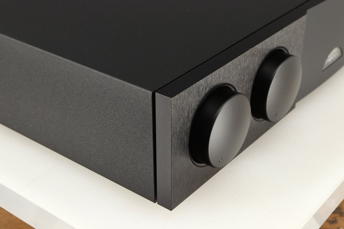 Front left corner of a used Naim Supernait 3 Integrated Amplifier in a black finish