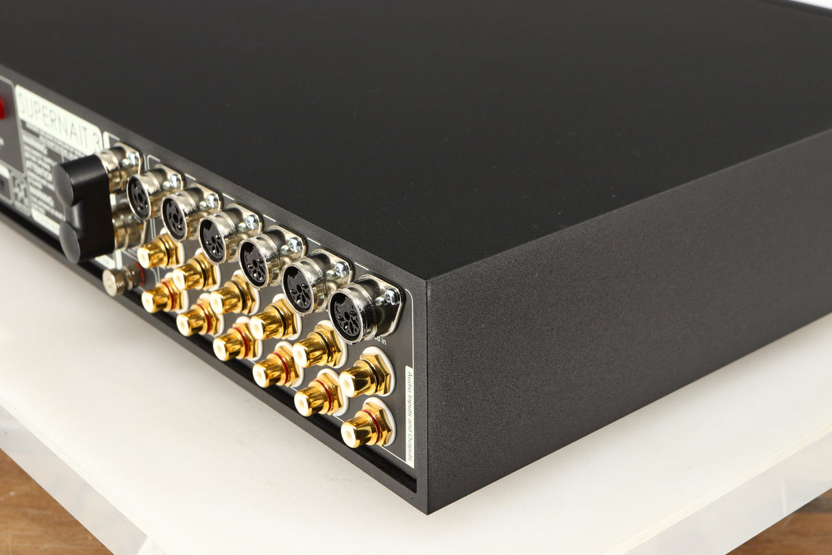 Rear left corner of a used Naim Supernait 3 Integrated Amplifier in a black finish