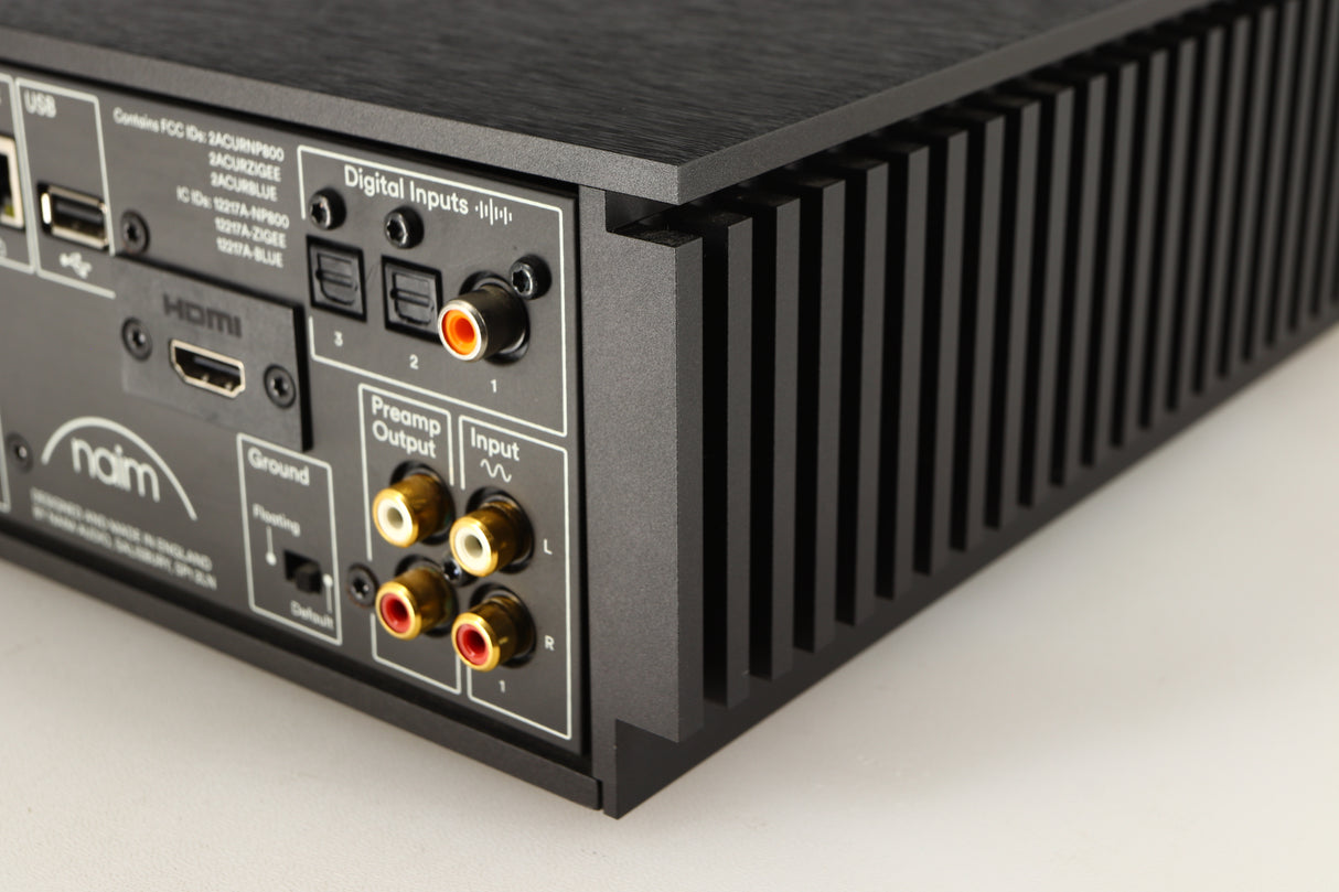 Rear left corner of a used Naim Uniti Atom HDMI Integrated System in a black finish