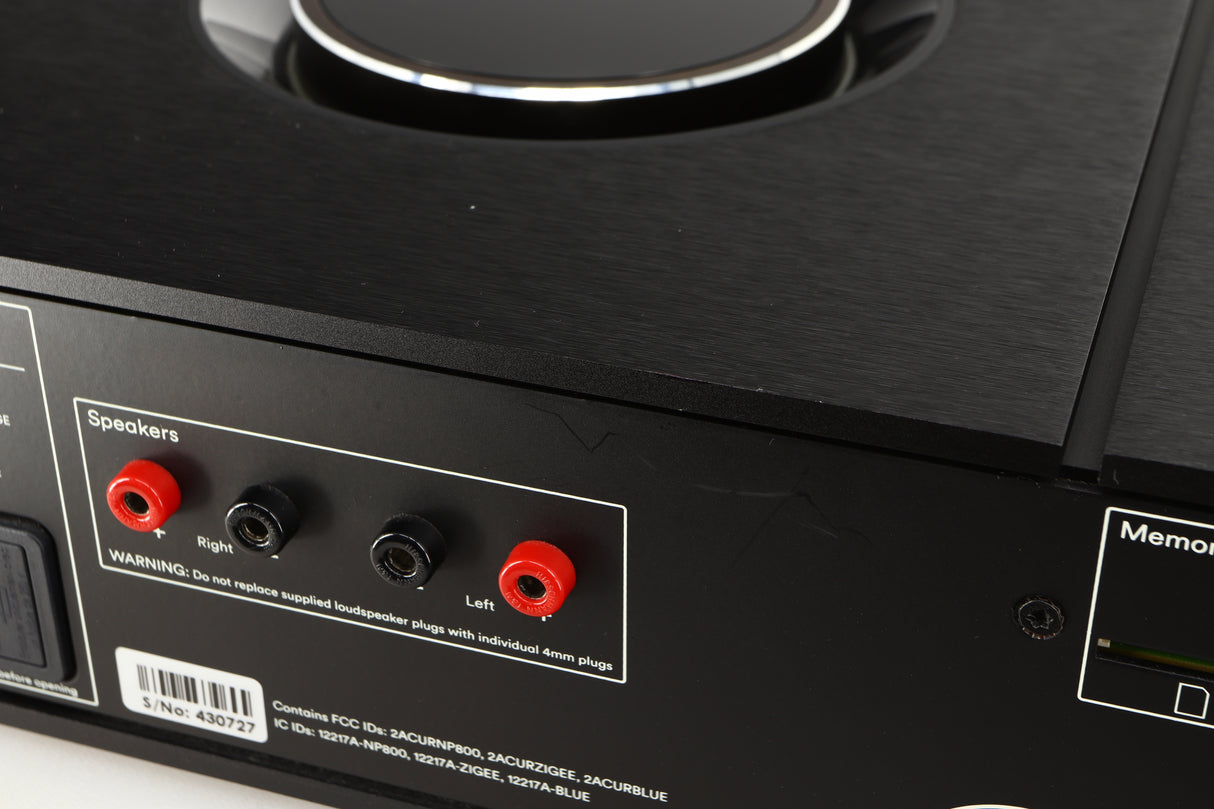 Close up of a used Naim Uniti Star Integrated Music System in a black finish showing scratches on rear
