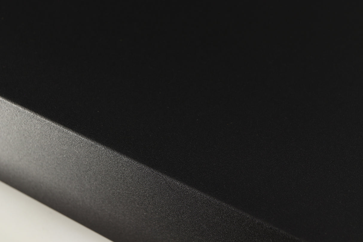 Close up of a used Naim XPS DR Power Supply in a black finish showing light scratch on left edge