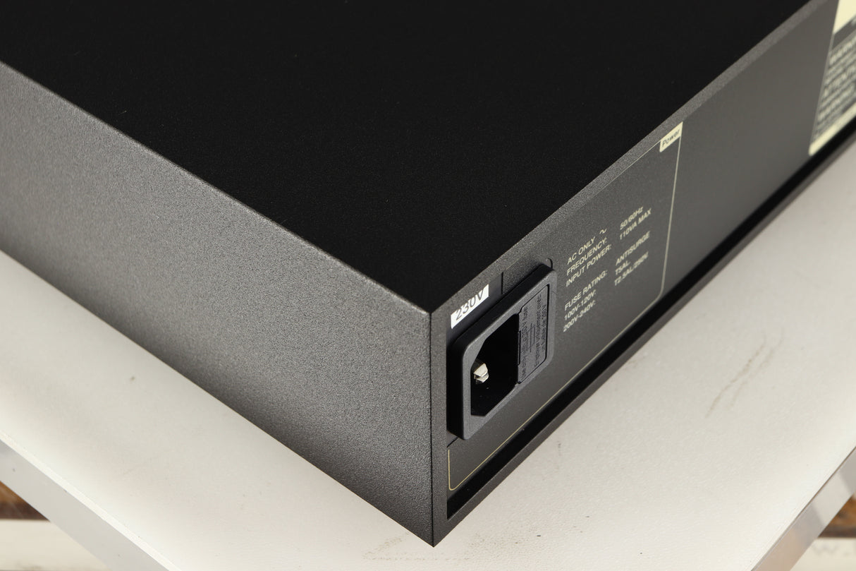 Rear right corner of a used Naim XPS DR Power Supply in a black finish
