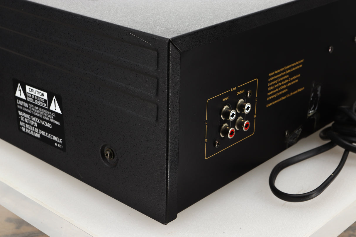 Rear left corner view of a used Nakamichi RX-202E Cassette Deck