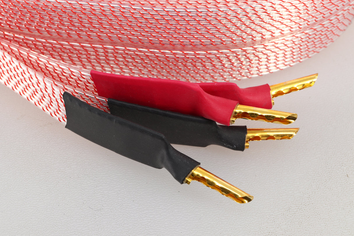 Close up of a used Nordost Heimdall 2 Speaker Cables 2.0m Pair in a pink finish showing connectors