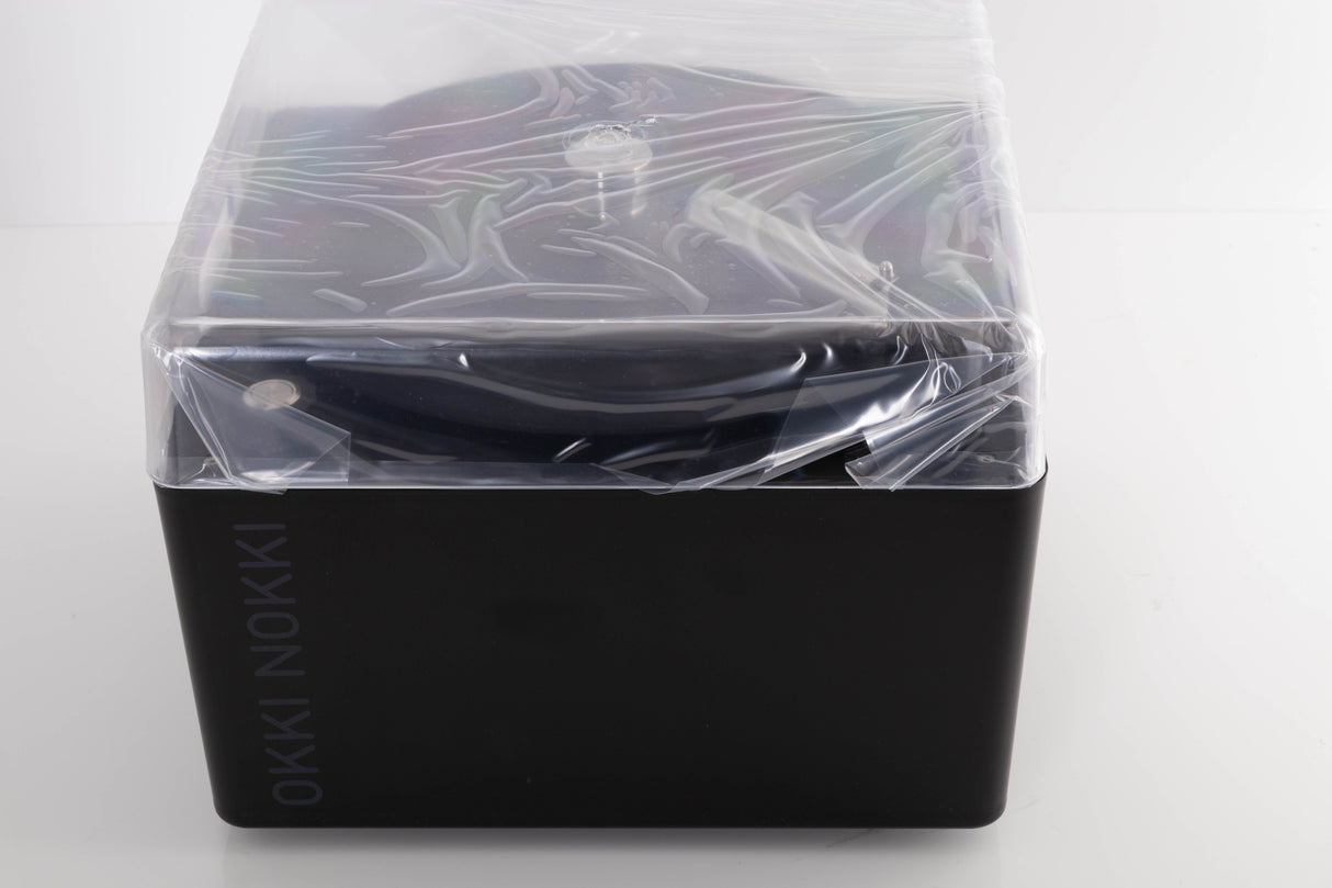 Top of a used Okki Nokki One Record Cleaning Machine in a Black finish showing Lid