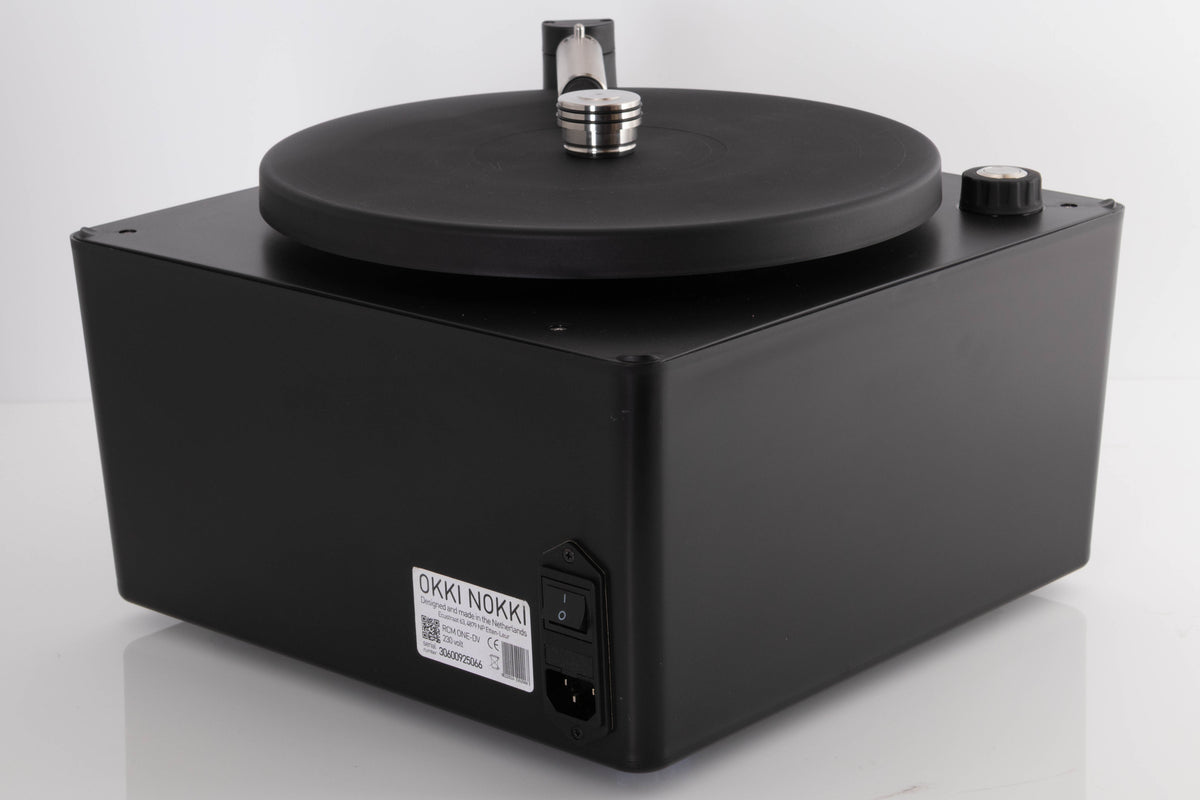 Rear left corner of a used Okki Nokki One Record Cleaning Machine in a Black finish