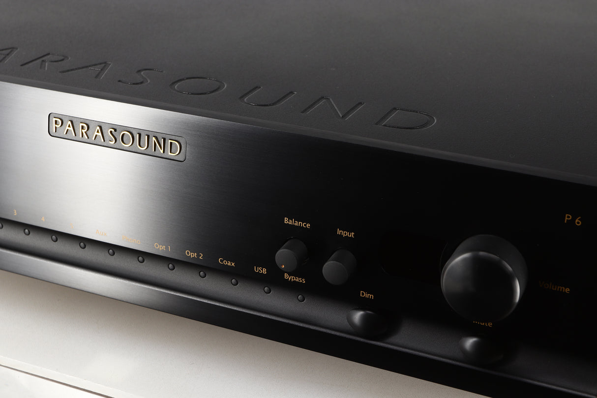 Close up of a used Parasound Halo P6 Pre Amplifier in a black finish showing some of the fascia
