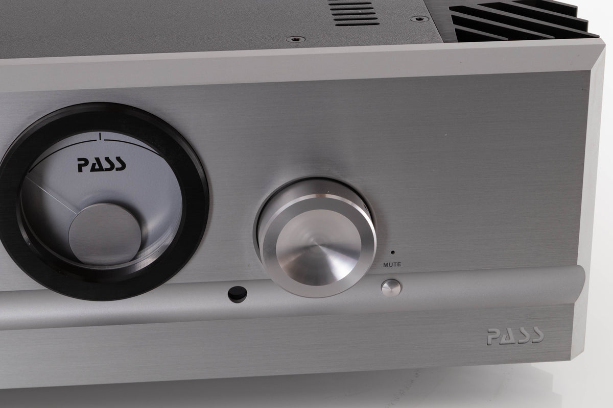Close up view of a used PASS Labs INT-60 Integrated Amplifier in Silver