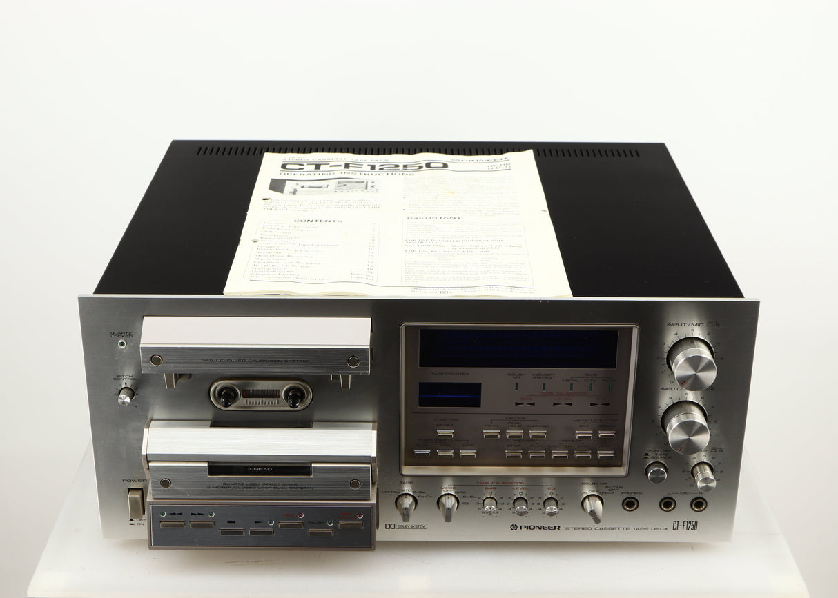 Top of a used Pioneer CT-F1250 Cassette Deck in a silver finish showing Manual