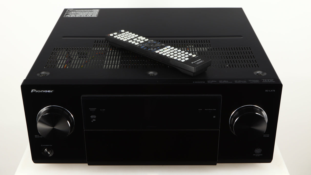 Top of a used Pioneer SC-LX75 AV Receiver in a black finish showing Remote