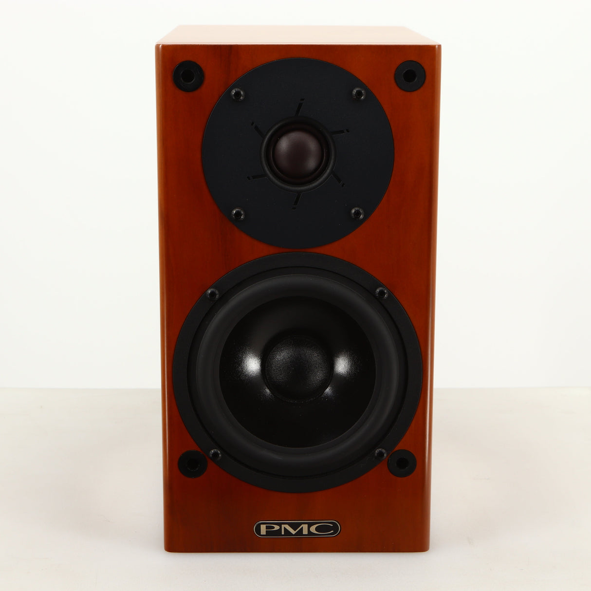 Front view of a used PMC DB1i Standmount Speaker in a cherry finish