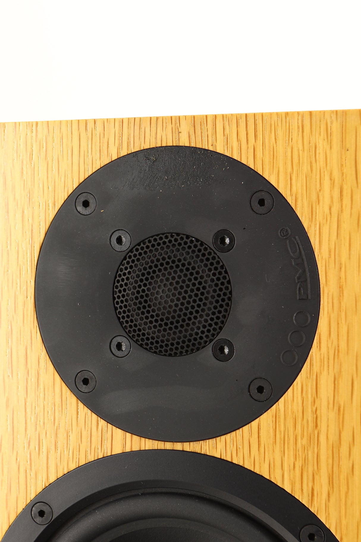 Close up of a used PMC FACT 8 Floorstanding Speakers in a light oak finish showing marks on tweeter surround