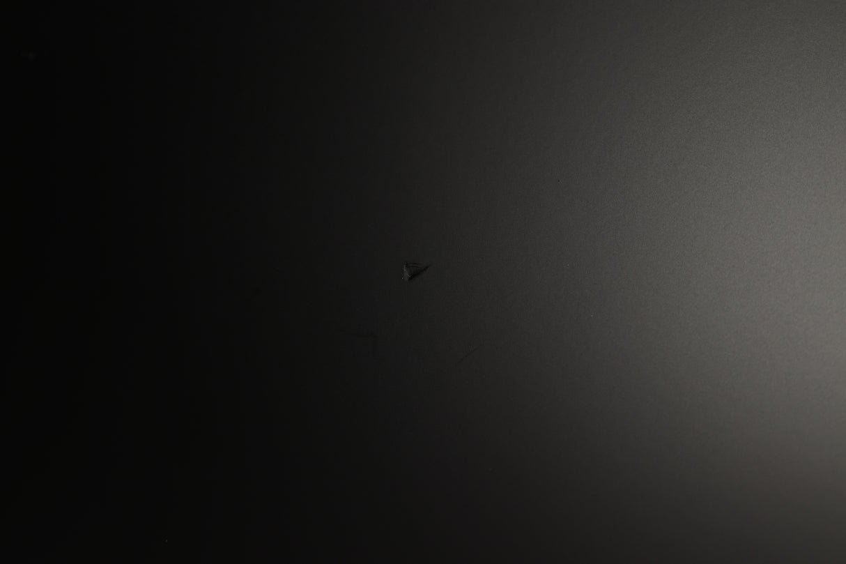 Close up of a used PMC Prodigy 1 Standmount Speakers in a black finish showing small indent