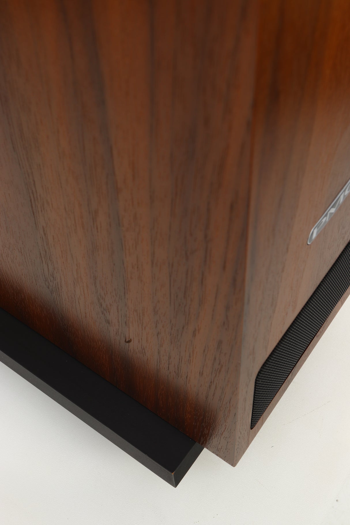 Close up of a used PMC Twenty 23 Floorstanding Speaker in a walnut finish showing small scratch